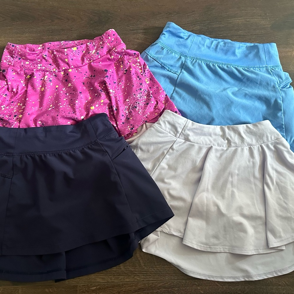 Set of Four Athletic Skorts in Pink, Blue, Black, and Gray - size XS 4-5